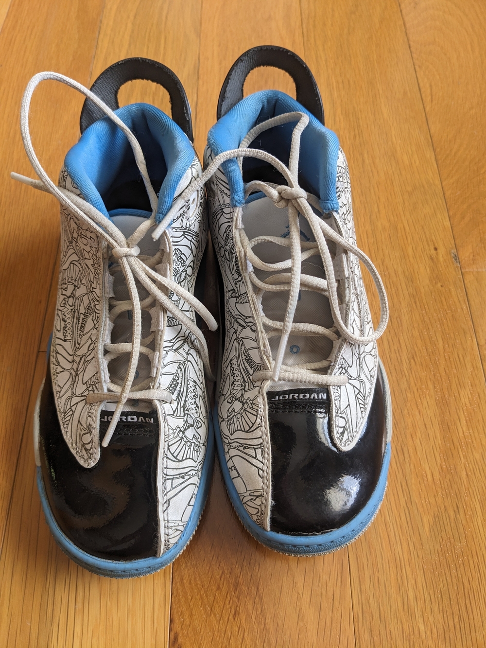 Jordan Kids' White & Black Basketball Sneakers with Blue Accents